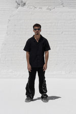 Load image into Gallery viewer, The Asili duo zipper jeans is a black denim jeans
