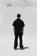 Load image into Gallery viewer, The Asili duo zipper jeans is a black denim jeans
