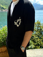 Load image into Gallery viewer, The أصيلي MADNESS KNIT SHIRT in the color black
