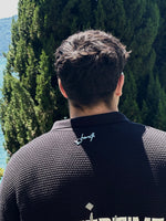 Load image into Gallery viewer, The أصيلي MADNESS KNIT SHIRT in the color black
