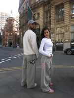 Load image into Gallery viewer, The Asili Mega baggy jeans in cloud grey with pink bubblegum embroidery
