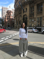 Load image into Gallery viewer, The Asili Mega baggy jeans in cloud grey black embroidery
