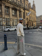 Load image into Gallery viewer, The Asili Mega baggy jeans in cloud grey with pink bubblegum embroidery
